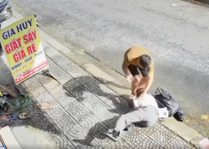 Phụ nữ bị hành hung giữa đường phố Đà Nẵng: Vụ việc gây chấn động - Ảnh 1.